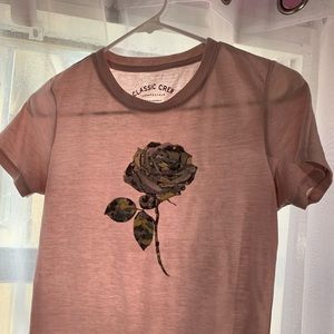 Shirt with a camouflage flower in the middle
